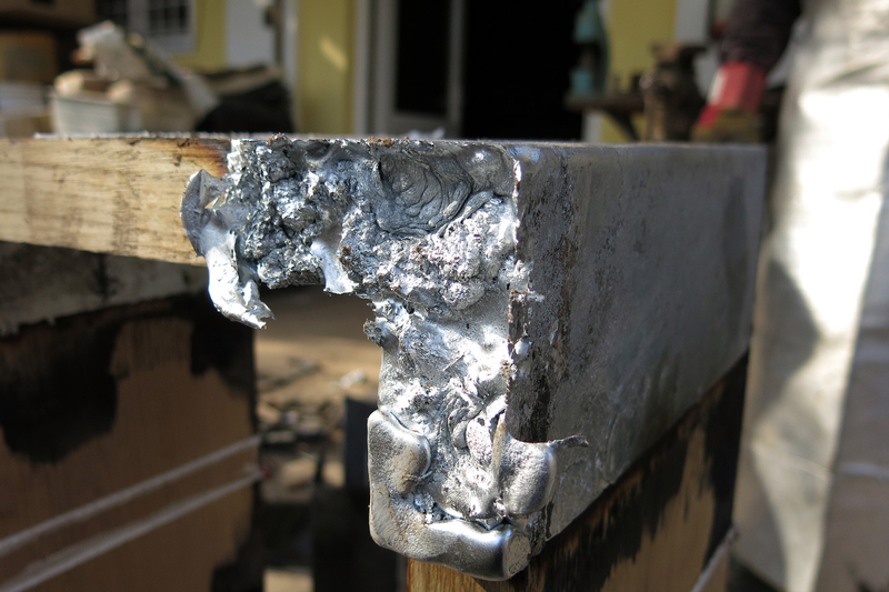 Illustration for article titled Casting Molten Metal On Wood With a Hungarian Design Master